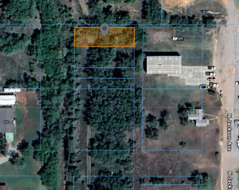 Behind 616 N Jackson Ave in Elk City, OK