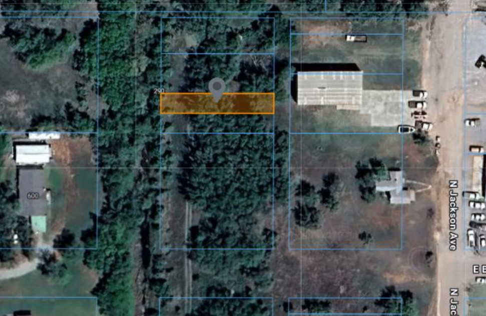 Behind 616 N Jackson Ave in Elk City, OK